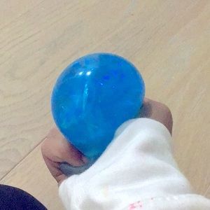 Blue water filled squishy.